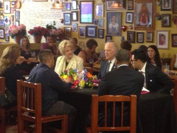 Vice President Joe Biden talks with Las Vegas Mayor Carolyn Goodman and other local leaders about raising the minimum wage during an event Monday, Oct. 6, 2014, at Casa Don Juan in downtown Las Vegas.