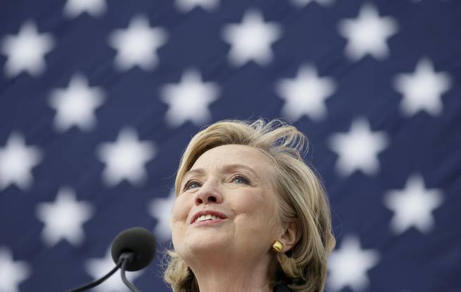 Former Secretary of State Hillary Rodham Clinton speaks during U.S. Sen. Tom Harkin's annual fundraising Steak Fry on Sunday, Sept. 14, 2014, in Indianola, Iowa. Clinton will spend much of October traveling to key states in the battle for control of the Senate.