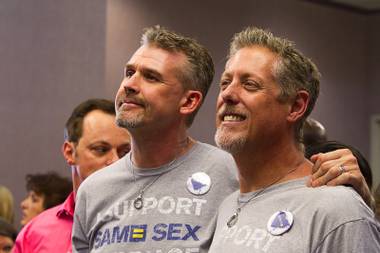 Tommy, left, and Rik Holman attend a celebration at The Gay and Lesbian Community Center of Southern Nevada (The Center) Tuesday, Oct. 7, 2014. The couple married in California this April, they said. People gathered to celebrate a ruling by the 9th U.S. Circuit Court of Appeals that overturned Nevada’s prohibition on gay marriage.