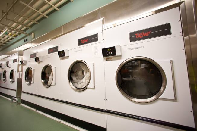 A look at the utility-grade dryer machines in the basement laundry facility at the Clark County Detention Center, Friday Oct. 3, 2014.