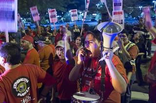 Culinary Union Local 226 members rally during a protest against Station Casinos in front of the Red Rock Resort Thursday, Oct. 9, 2014.