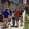 Shoppers make their way along walkways Thursday, Oct. 9, 2014, during the grand opening of Downtown Summerlin.
