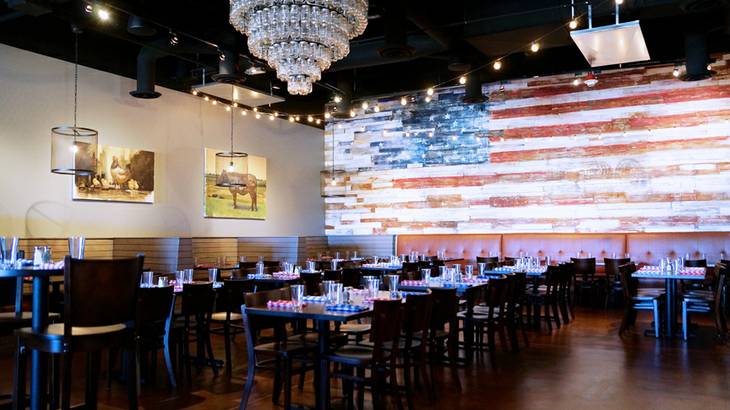 The new Pot Liquor Contemporary American Smokehouse, above, seats up to 258 guests.
