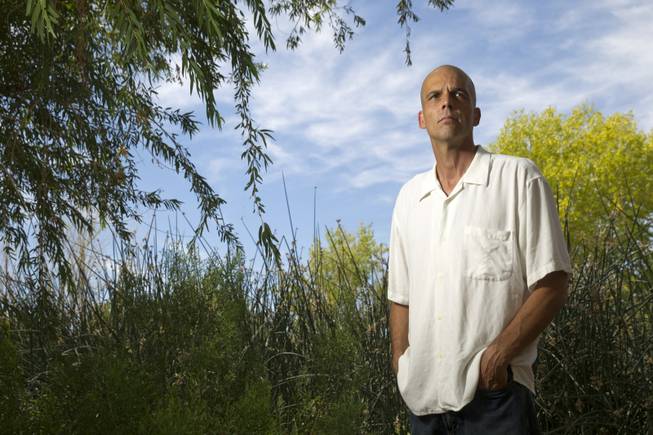 John Roberts, a practicing Druid, poses in the Clark County Wetlands Park. 
