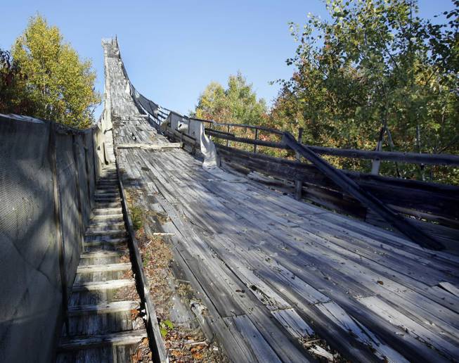 This photo taken Saturday, Sept. 27, 2014, shows the in-run of the Nansen Ski jump in Milan, N.H. The legendary ski jump for decades lured some of the biggest names in jumping and was host to Olympic tryouts, World Cup competitions and four national championships before its last competition in 1985.
