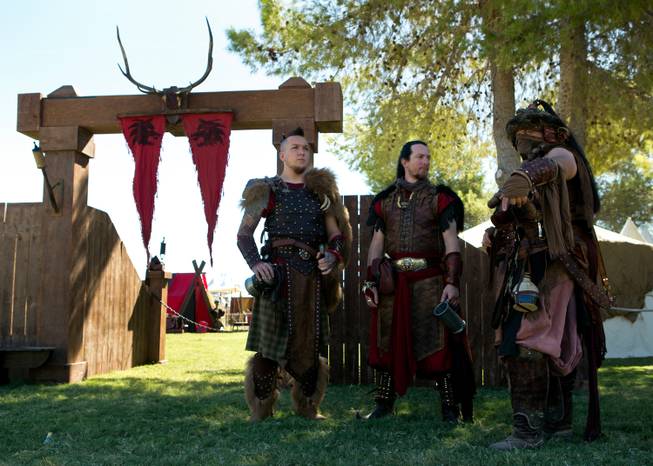 Russell "Drake" Drake, Cecil "Dango" Hughes and Cordell "Khan" McCurdy are members of the Dogs of War Guild participating in the Renaissance Festival at Sunset Park on Saturday, October 11, 2014.