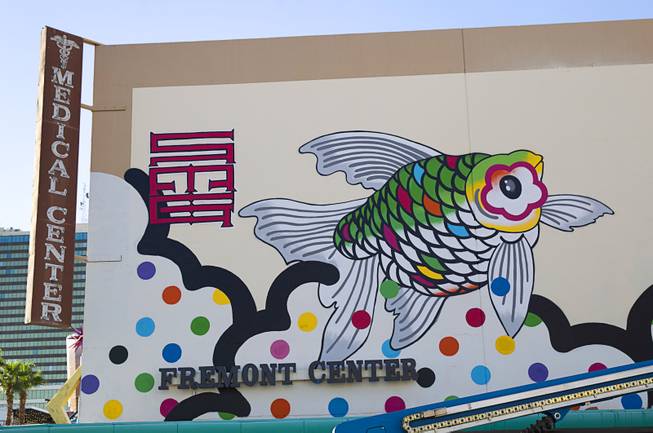 A mural by artists Sush Machida and Tim Bavington is shown under construction on the side of the Emergency Arts building at Fremont and Sixth streets in downtown Las Vegas Sunday, Oct. 12, 2014.