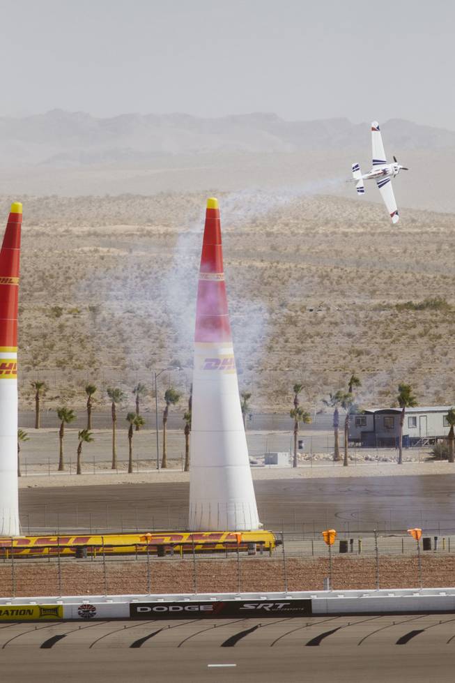 Planes race through the air on the second day at the Red Bull Air Race at the Las Vegas Motor Speedway on October 12, 2014.