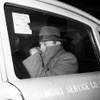In this Nov. 16, 1960, file photo, convicted atom bomb spy David Greenglass sits in a taxi leaving New York's Federal House of Detention. The former Army sergeant whose testimony led to the conviction and execution of his sister, Ethel Rosenberg, and brother-in-law, Julius Rosenberg, died on July 1. He was 92. 