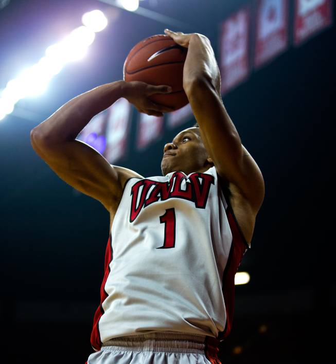 The UNLV basketball team's Rashad Vaughn #1 posts up for a jump shot during the scarlet and gray exhibition game at the Thomas & Mack Center on Thursday, October 16, 2014..