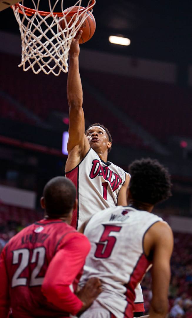 The UNLV basketball team's Rashad Vaughn #1 lay the ball in during the scarlet and gray exhibition game at the Thomas & Mack Center on Thursday, October 16, 2014. .