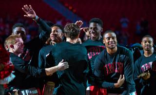 UNLV basketball players gather for the scarlet and gray exhibition, which is the Rebels' version of midnight madness, at the Thomas & Mack Center on Thursday, Oct. 16, 2014.