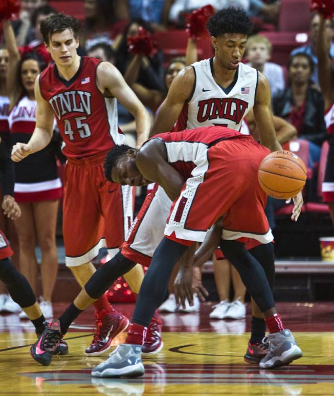 The UNLV basketball team's Goodluck Okonoboh #11 loses the ball behind him during the scarlet and gray exhibition game at the Thomas & Mack Center on Thursday, October 16, 2014.