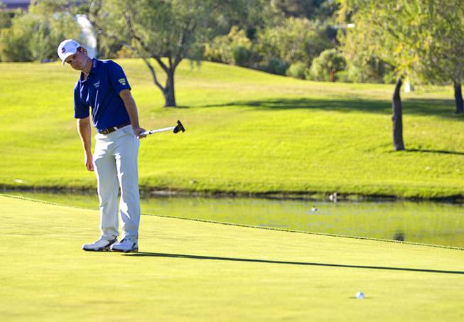 Kevin Streelman watches as his birdie putt drops into the hole on the 17th green during the Shriners Hospitals for Children Open golf tournament at TPC Summerlin Sunday, Oct. 19, 2014. Streelman finished in second place.