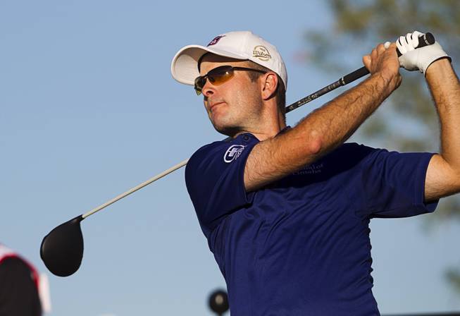 Kevin Streelman drives off the 18th tee during the Shriners Hospitals for Children Open golf tournament at TPC Summerlin Sunday, Oct. 19, 2014. Streelman finished in second place.