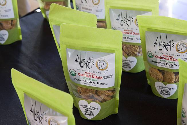 Gourmet dog treats by Alaska's Bakery are displayed in a vendor area during the 24th Annual Las Vegas Police K9 Trials at the Orleans Arena Sunday, Oct. 19, 2014.