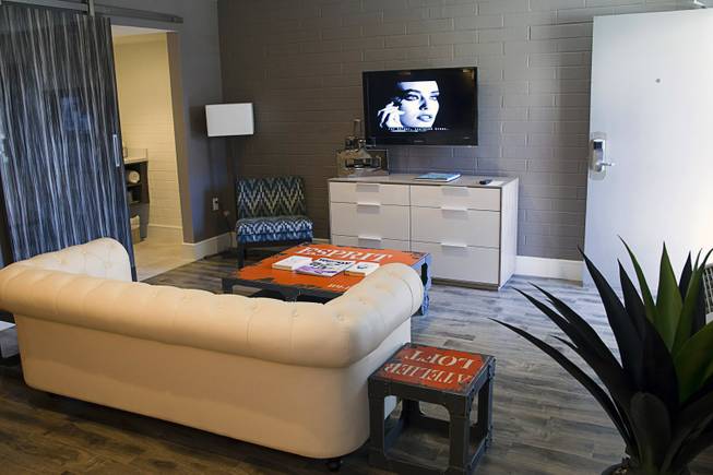 A bathroom is shown in the Ultimate Crash Pad suite in  Oasis at Gold Spike in downtown Las Vegas Tuesday, Oct. 21, 2014. The Oasis, a boutique hotel owned and operated by the Downtown Project, officially unveiled renovations during a tour Tuesday. The suite was created by combining two of the older hotel rooms.