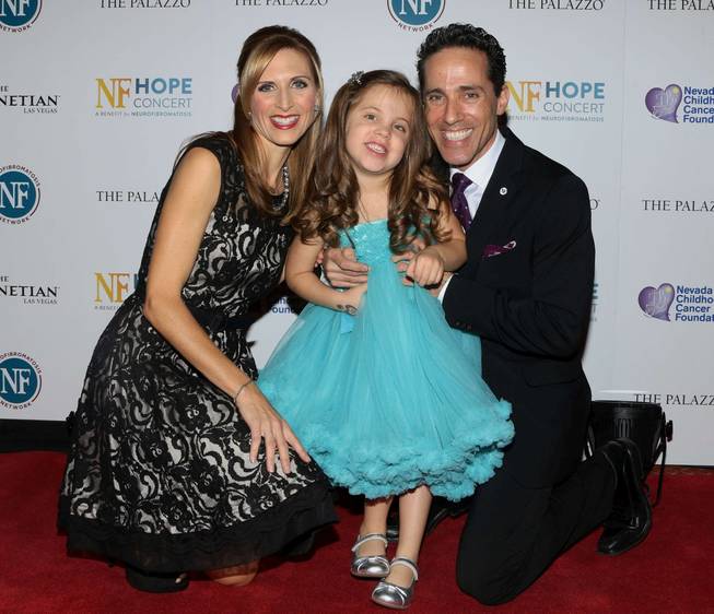 Melody, Emma and Jeff Leibow arrive at “The NF Hope Concert” on Sunday, Oct. 19, 2014, at the Venetian.