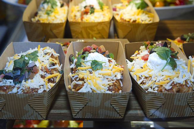 Beef chimichangas are displayed at the new Fulton Street Food Hall at Harrahs Las Vegas Wednesday, Oct. 22, 2014.
