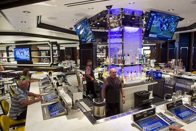 A view of the Fulton Street Bar in the new Fulton Street Food Hall at Harrahs Las Vegas Wednesday, Oct. 22, 2014.
