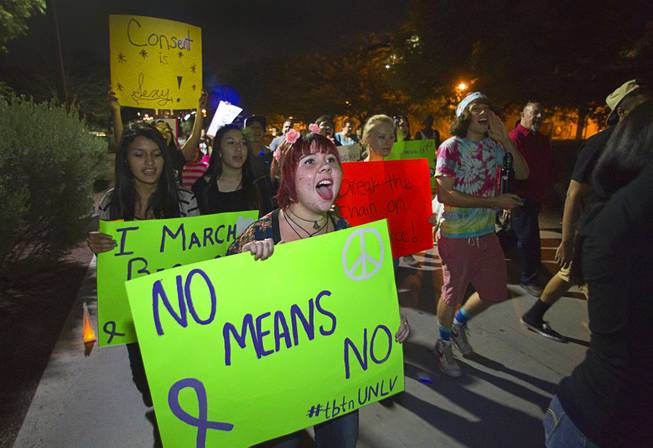 UNLV student Miracle Grace marches during the 21st Annual Take Back the Night rally at UNLV Thursday, Oct. 23, 2014.