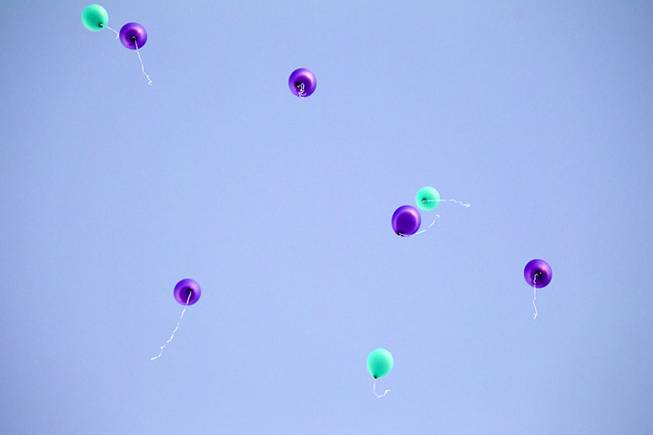 Balloons are launched during the 21st Annual Take Back the Night rally at UNLV Thursday, Oct. 23, 2014.