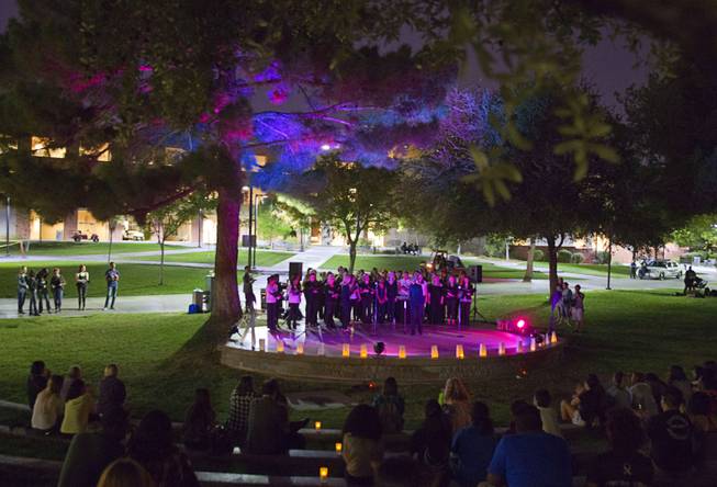 Members of the UNLV Women's choir perform during the 21st Annual Take Back the Night rally at UNLV Thursday, Oct. 23, 2014.
