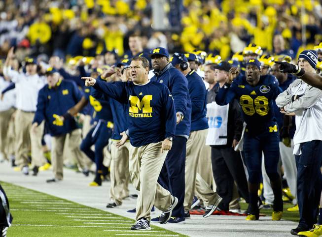 Michigan head coach Brady Hoke reacts on the sideline in the fourth quarter of an NCAA college football game against Penn State in Ann Arbor, Mich., Saturday, Oct. 11, 2014. Michigan won 18-13. (AP Photo/Tony Ding)