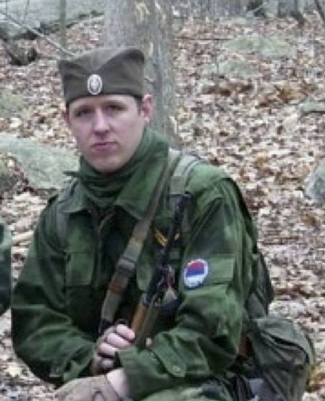 This undated file photo provided by the Pennsylvania State Police shows Eric Frein, who has eluded police, but is charged with killing one Pennsylvania state trooper and seriously wounding another in a late night ambush.