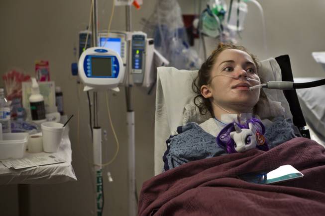Jessica Small, pictured here Friday, Oct. 17, 2014, was shot and paralyzed from the neck down by her boyfriend in June and has since been undergoing physical and occupational therapy at Spring Valley Hospital.