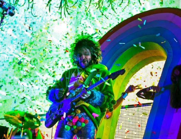 Mark Coyne of The Flaming Lips entertains an energetic crowd as they perform on the Ambassador Stage during day 2 of the Life is Beautiful Festival on Friday, October 24, 2014.