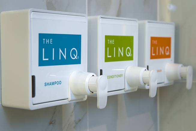 Shampoo and conditioner dispensers are shown in the shower of a standard room during a tour of the Linq Hotel and Casino (formerly the Imperial Palace and The Quad) Monday, Oct. 27, 2014. The casino in the first phase of a $223 million renovation project.
