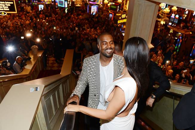 Kim Kardashian West, with husband Kanye West, makes her way ...
