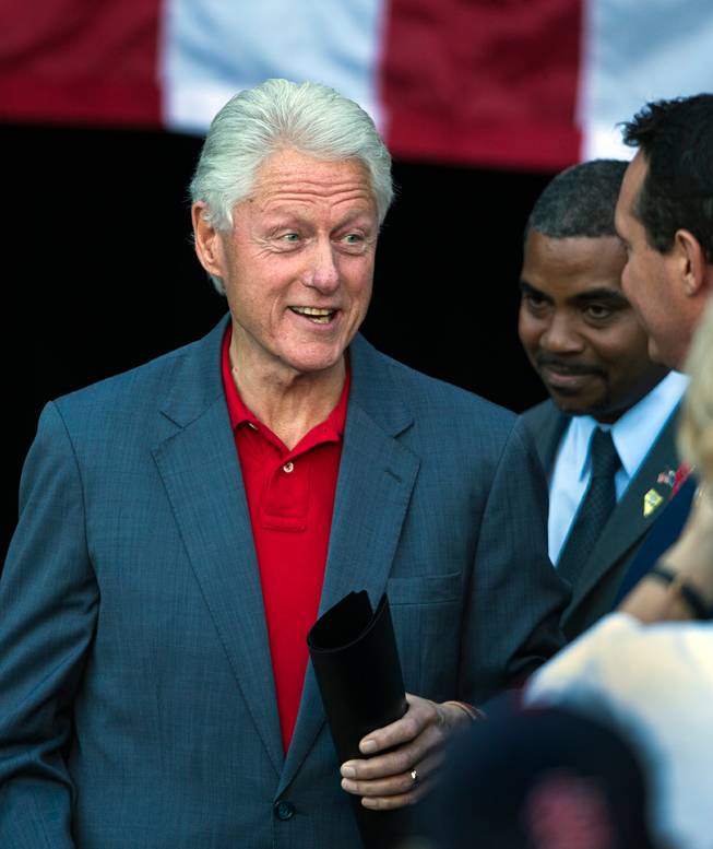 Former President Bill Clinton arrives for the Vote Early, Vote Now rally to stump for Nevada Democratic candidates at the Las Vegas Springs Preserve on Thursday, October 23, 2014.