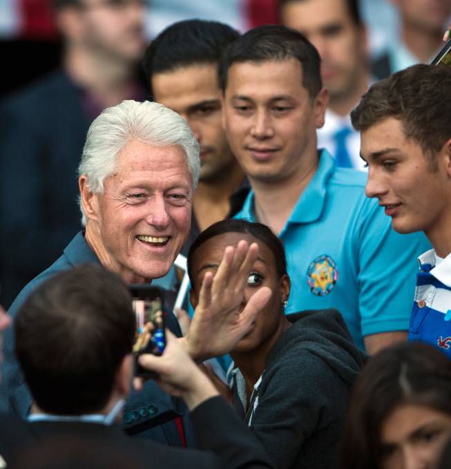 Former President Bill Clinton greets members of the crowd following the Vote Early, Vote Now rally for Nevada Democratic candidates at the Las Vegas Springs Preserve on Thursday, October 23, 2014.