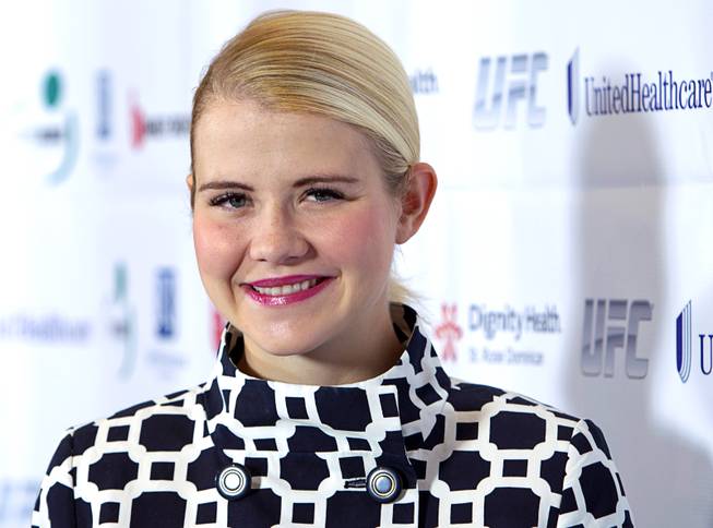 Elizabeth Smart poses following a news conference at the Rio Wednesday, Oct. 29, 2014. Smart is the keynote speaker for the Rape Crisis Center's Signs of Hope 40th anniversary dinner at the Rio.