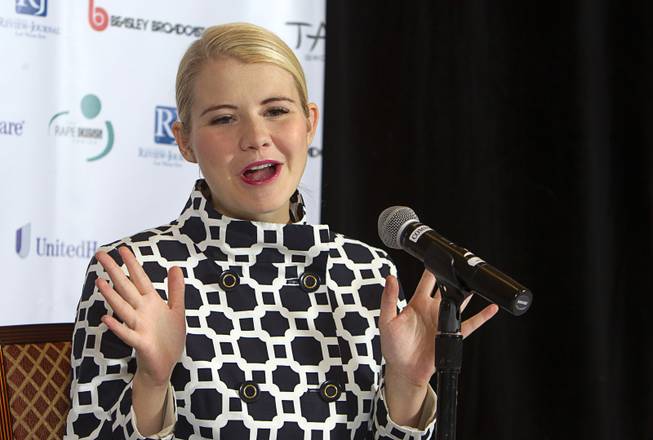 Elizabeth Smart responds to a question during a news conference at the Rio Wednesday, Oct. 29, 2014. Smart is the keynote speaker for the Rape Crisis Center's Signs of Hope 40th anniversary dinner at the Rio.