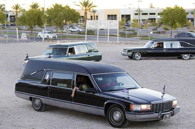 Jeff Burns aka Cardinal Sin, arrives in a parade of hearses during a wedding at the Freakling Bros.' Trilogy of Terror haunted house attraction Wednesday, Oct. 29, 2014. Burns married Michael Kimball, his longtime partner and a former Freakling Bros. actor.