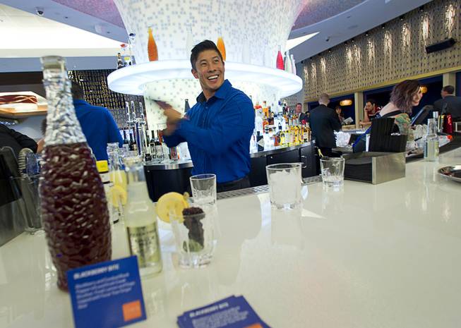 Bartender Mark Kiyojima makes a Blackberry Bite cocktail at Bar 3535 during the official opening of the Linq hotel-casino Thursday, Oct. 30, 2014. The property, formerly the Imperial Palace and The Quad, is in the process of a $223 million renovation.