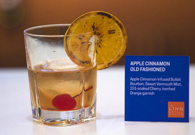 An Apple Cinnamon Old Fashioned is displayed at Bar 3535 during the official opening of the Linq hotel-casino Thursday, Oct. 30, 2014. The property, formerly the Imperial Palace and The Quad, is in the process of a $223 million renovation.