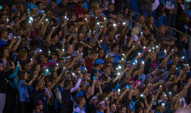 Centennial flicker lights for their players during their game versus Arbor View on Thursday, October 30, 2014.