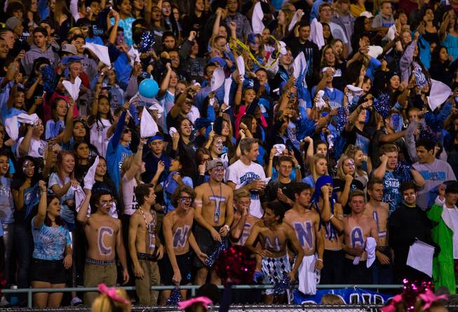 Centennial fans cheer for their players during their game versus Arbor View on Thursday, October 30, 2014.