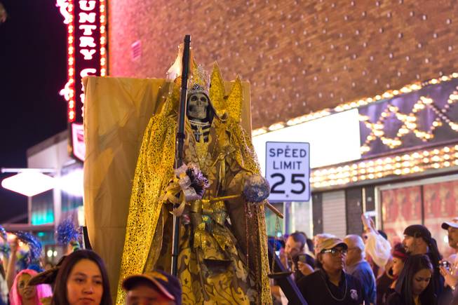 A "Day of the Dead" altar makes its way down Fremont Street during the 2014 Las Vegas Halloween Parade, Friday Oct. 31, 2014.