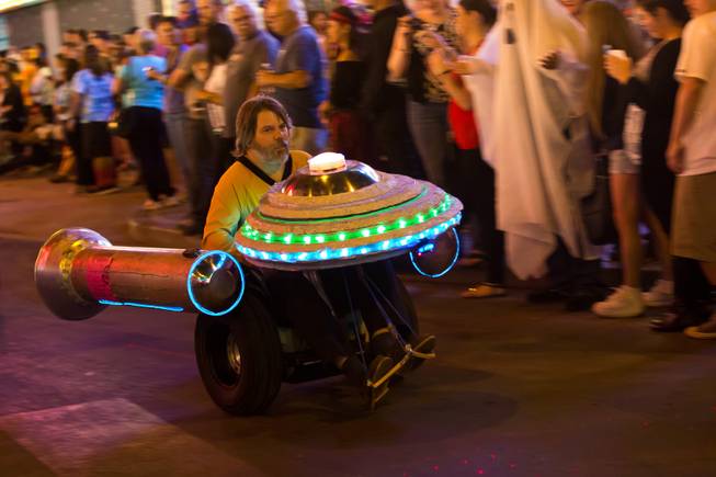 A mini Starship Enterprise drives down Fremont Street during the 2014 Las Vegas Halloween Parade, Friday Oct. 31, 2014.