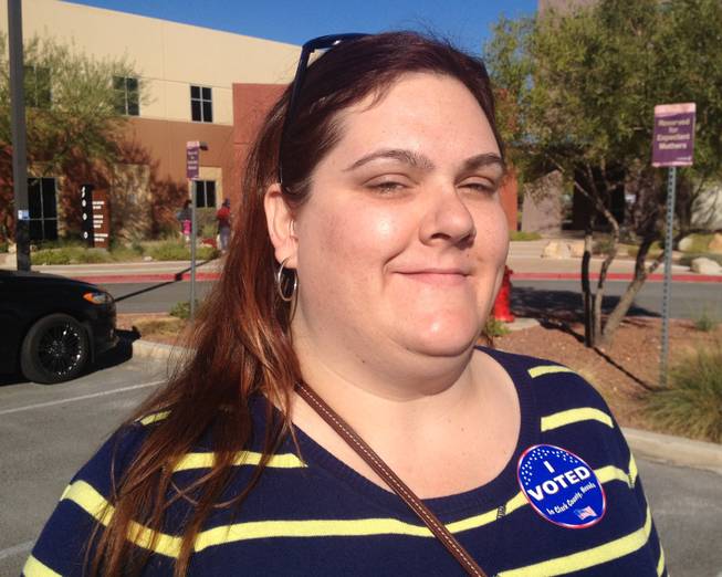 Voter Anna McCann, 35, outside the Crossing Church polling site on Election Day on Nov. 4, 2014.