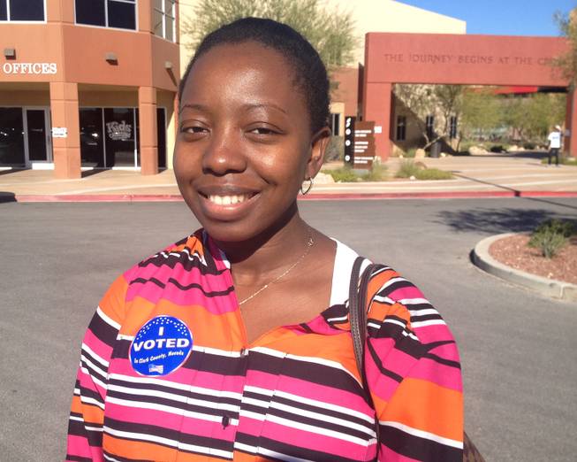 Voter Ghislaine Dongmo, 27, outside the Crossing Church polling site on Election Day on Nov. 4, 2014.