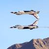 The U.S. Air Force Thunderbirds perform a Calypso Pass maneuver during the 2014 Aviation Nation open house at Nellis Air Force Base Sunday, Nov. 9, 2014.