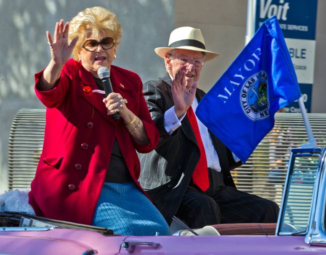 Las Vegas Mayor Carolyn Goodman and her husband Oscar greet the Veteran's Day Parade crowd lined along S. 4th Street in Downtown Las Vegas on Tuesday, November 11, 2014.