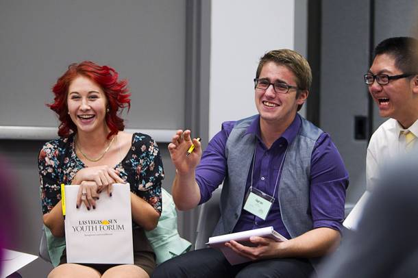 Miranda McGeahy of Southern Nevada High School, and Aaron Palmer of Sierra Vista, laugh during a discussion of marijuana legalization at the 58th annual Las Vegas Sun Youth Forum in the Las Vegas Convention Center Thursday, Nov. 13, 2014.