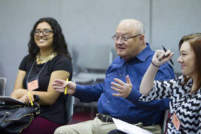 Robert David Fisher, president and CEO of the Nevada Broadcasters Association moderates a discussion during the 58th annual Las Vegas Sun Youth Forum at the Las Vegas Convention Center Thursday, Nov. 13, 2014.